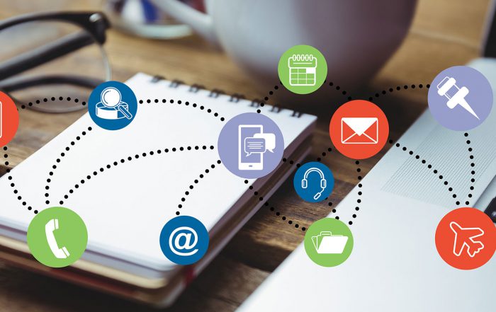 Image shows symbols representing the flow through the process of party wall letters overlaid on an office desk background